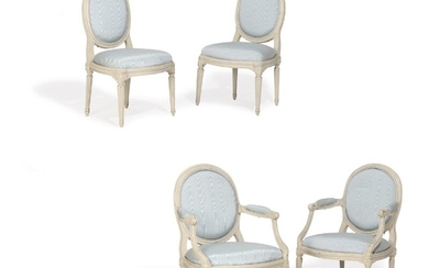 A pair of French whitepainted Louis XVI armchairs and chairs. Signed Nadal. Maker Jean-René Nadal, 1733–1783. (4)