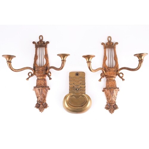 A pair of gilt bronze wall sconces, in the French Empire sty...