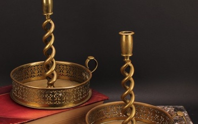 A pair of large late Victorian brass open-twist chamberstick...