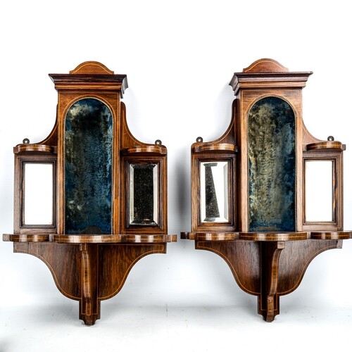 A pair of late Victorian rosewood wall brackets, central vel...