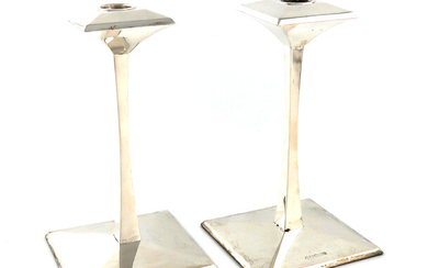 A pair of modern silver candlesticks