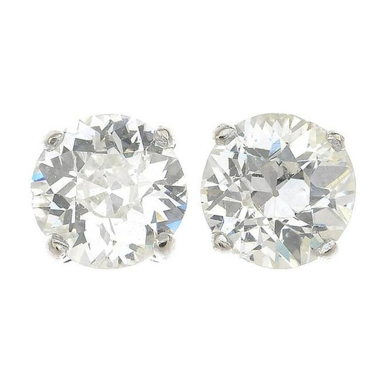 A pair of old-cut diamond single-stone stud