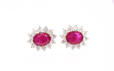 A pair of ruby and diamond set 18ct white gold...