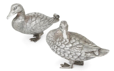 A pair of silver ducks, London, 1992, Comyns of London, both realistically chased with feathers and webbed feet, the hen modelled preening its feathers, the drake with curled tail, 10.5 and 11cm high, 15.5 and 17cm long (2)