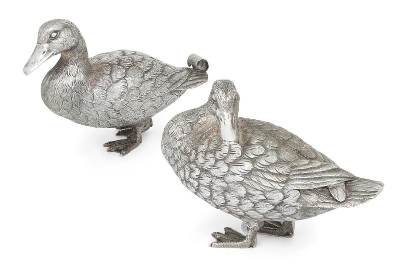 A pair of silver ducks, London, 1992, Comyns of London, both realistically chased with feathers and webbed feet, the hen modelled preening its feathers, the drake with curled tail, 10.5 and 11cm high, 15.5 and 17cm long (2)