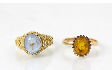 A paste set dress ring, the oval cut blue stone leading to o...