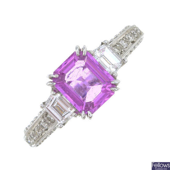 A pink sapphire and vari-cut diamond dress ring.