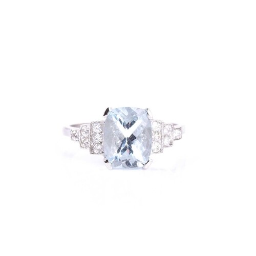 A platinum, diamond, and aquamarine ring, set with a mixed c...
