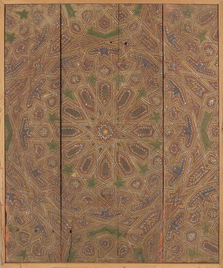 A polychrome wood ceiling panel, Spain or Morocco, circa 18th-19th century, in four panels, of rectangular shape painted in red, blue, green and gold pigments with geometric designs in low relief, in later wood frame, 108.5 x 91cm.