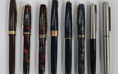 A quantity of fountain and roller ball pens, including four Burnham fountain pens and various Parker