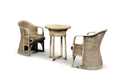 A rattan set comprising a circular table and two armchairs, Jugendstil, Vienna, 1910