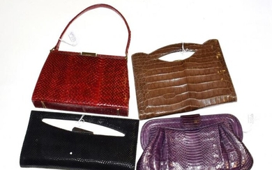 A red Fassbender handbag, a brown crocodile style bag with...