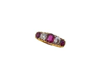 A ruby and diamond carved half hoop ring