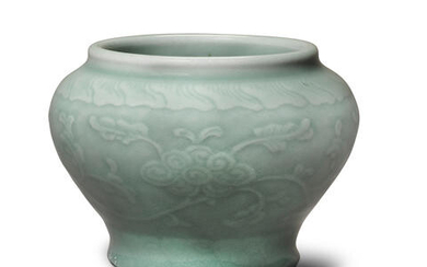 A small celadon-glazed porcelain baluster jar