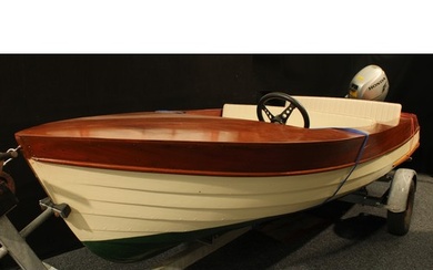 A vintage mid-20th century Broom day cruiser or river boat, ...