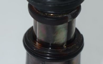 AN ANTIQUE MOTHER OF PEARL MONOCULAR. 54 grams. 7 cm x 3.75 cm.