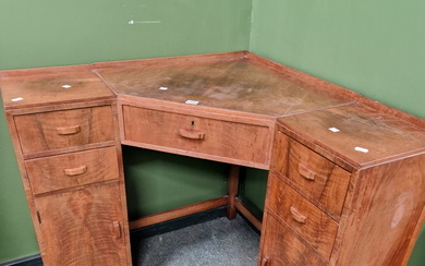 AN ART DECO WALNUT CORNER DRESSING TABLE AND STOOL TOGETHER WITH A TALLBOY CABINET