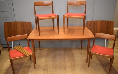 AN AUSTRALIAN MODERNTONE EXTENSION DINING TABLE WITH FOUR CHAIRS