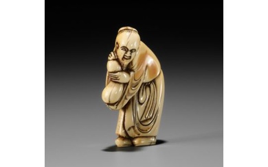 AN EARLY IVORY NETSUKE OF A CHINESE IMMORTAL WITH A GOURD