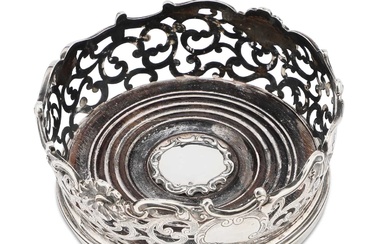AN EARLY VICTORIAN SILVER WINE COASTER