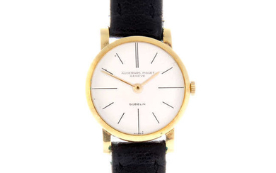 AUDEMARS PIGUET - a lady's yellow metal wrist watch retailed by Gübelin.