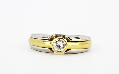 An 18ct white and yellow gold diamond solitaire ring, estimated approx. 0.33ct, (R).