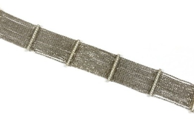 An 18ct white gold diamond set bracelet