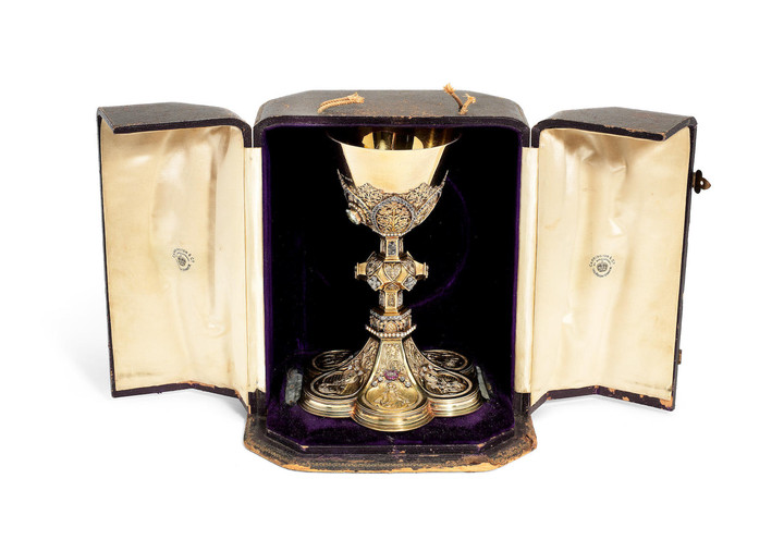 An Edwardian jewelled silver-gilt chalice