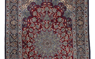 An Isfahan rug, Persia. Medallion design. Knotted on silk warps. Late 20th...