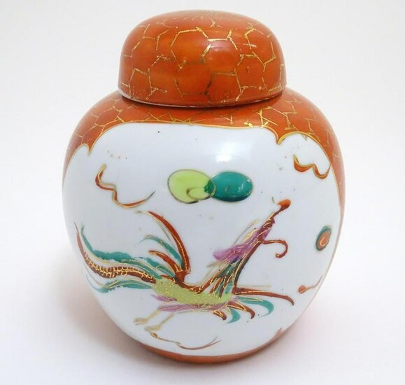 An Oriental ginger jar with hand painted decoration