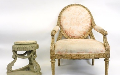 An armchair and side table. Early 20th century