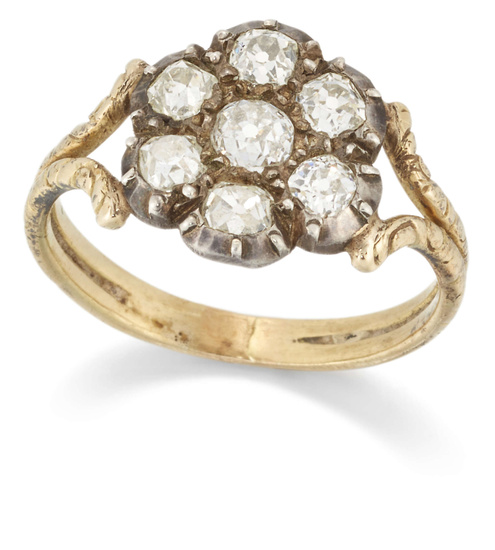 An early 19th century diamond cluster ring, the circular silver-set...