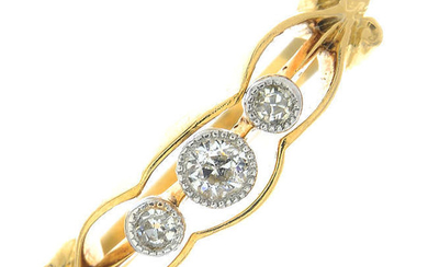 An early 20th century 18ct gold old-cut diamond three-stone ring.
