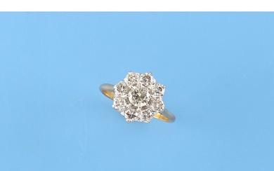 An unmarked 18ct yellow gold (tested) diamond cluster ring, ...