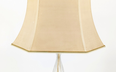 BRASS AND GLASS FLOOR LAMP WITH BEIGE LAMPSHADE: ELEGANCE AND DELICATE COLOR ACCENT.