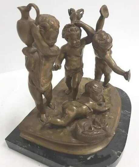 Bronze cherub figural group with goat on marble base