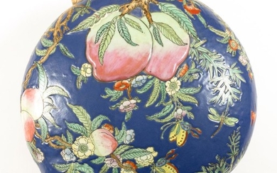 CHINESE FAMILLE ROSE PORCELAIN PEACH-FORM COVERED BOX Raised peach branch and butterfly decoration on a powder blue ground. Four-cha...