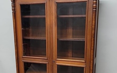 Circa 1880'sBurl Walnut 2 door Bookcase/ Curio with burl walnut columns and 2 drawer base. Retains