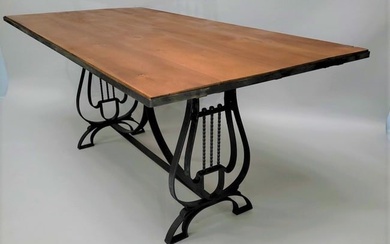 Circa 1920's Wrought Iron Table with Harp Shaped underside décor. L 65" w 33" hgt 29". Has