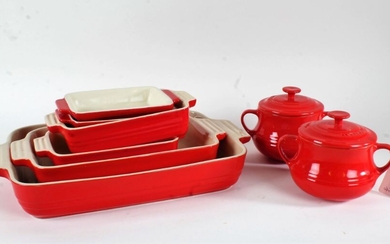 Collection of Le Creuset, to include two pots and covers, a large cooking dish and three smaller