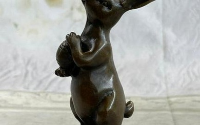 Cuddly Little Bunny Holding a Basket Full of Carrots Bronze Statue