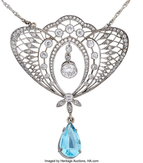 Diamond, Aquamarine, Platinum, White Gold Pendant-Brooch The pendant-brooch features...