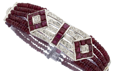 Diamond, Ruby, White Gold Bracelet Stones: Full-cut diamonds weighing...