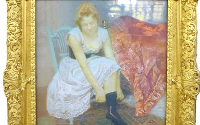 Ecole de la fin du XIXe siècle. Jeune femme enfilant ses bas. Pastel sur papier...