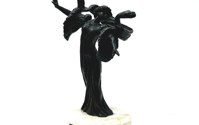 FIGURE OF A BALLERINA WITH RIBBON. BRONZE WITH MARBLE AND ONYX BASE.