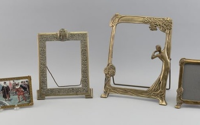 FOUR ART NOUVEAU BRASS PICTURE FRAMES Late 19th/Early 20th Century From 4" x 6" to 11.75" x 8.75".