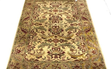 Fawn ground thick pile wool rug, the central field...