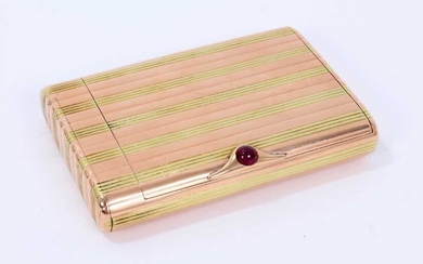 Fine Imperial Russian Faberge two colour striped gold cigarette case of retangular form with concealed vesta case to one end with striking plate to the interior of the lid, cabochon ruby thumb piec...