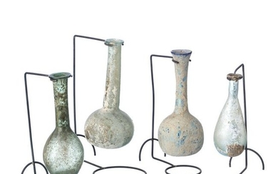Four Roman glass vials