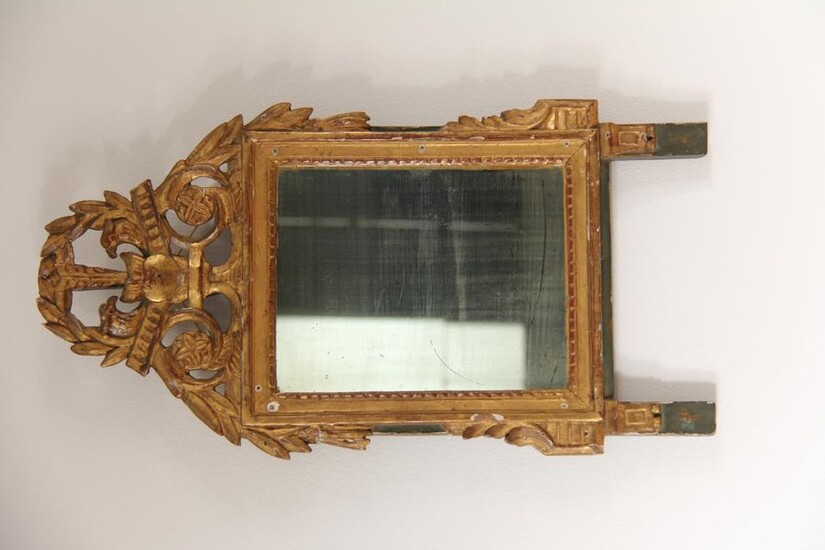 *Gilt wood carved glass with openwork pediment of heart and foliage, 18th c.